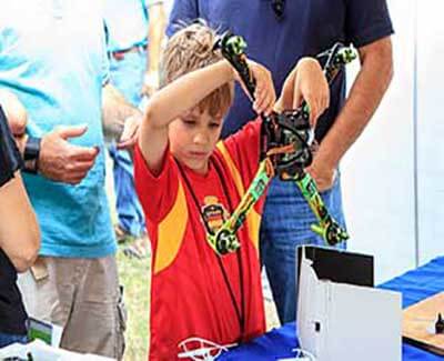 MAKER FAIRE BOY WITH DRONE